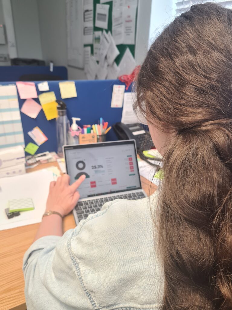 Student in front of a computer using Attender